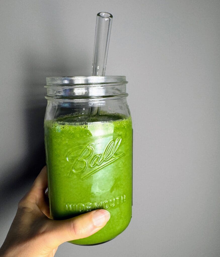 Green smoothie with ground chia seeds showing practical nutrition integration